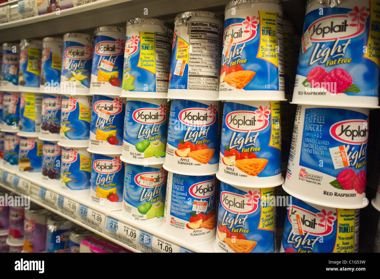 Containers of milk in a supermarket refrigerator in New York Stock Photo -  Alamy