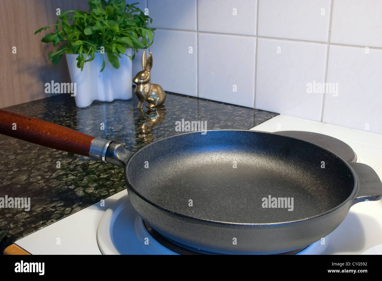 fryingpan on a electric cooker Stock Photo Alamy
