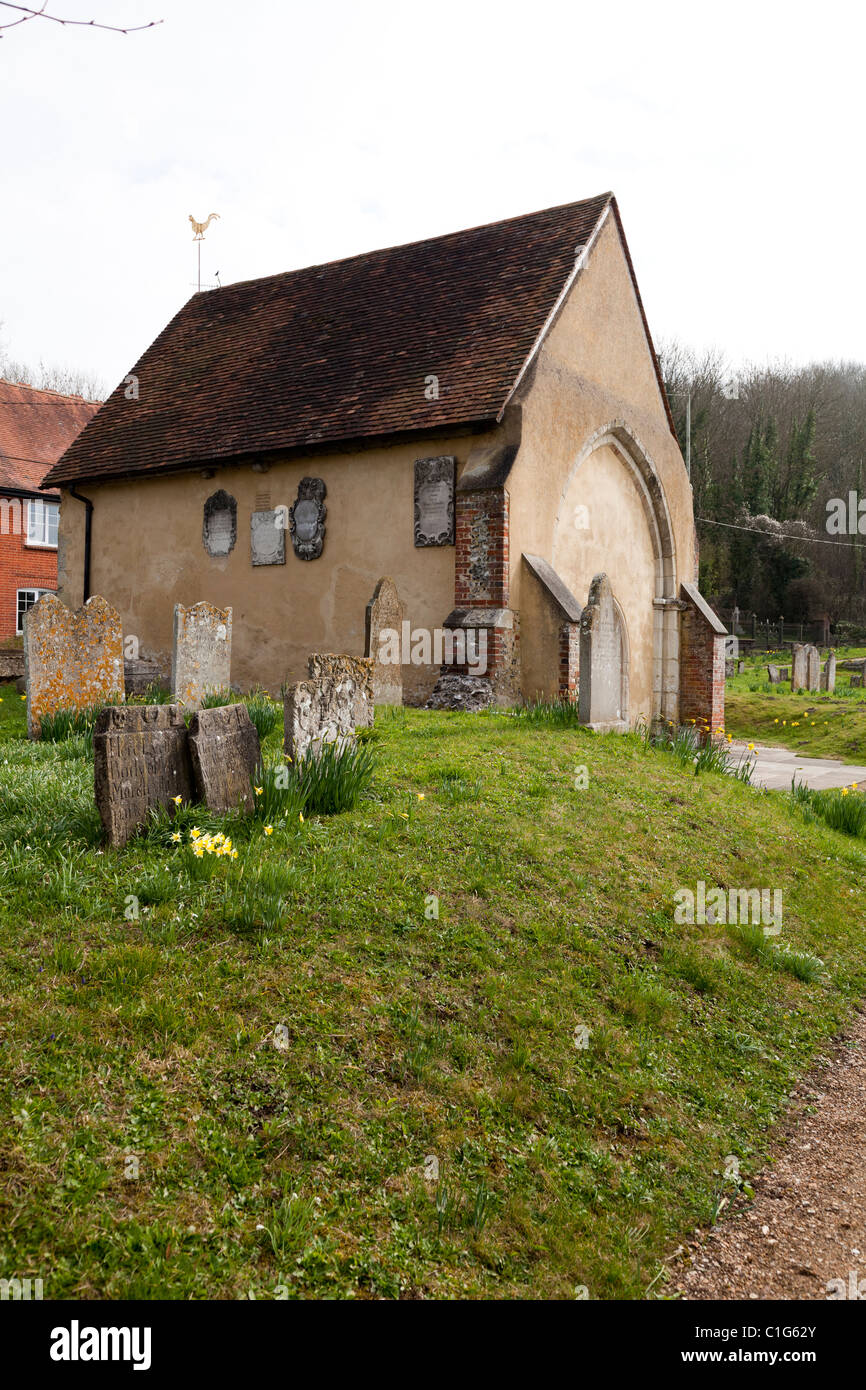 old 12 Century St Peters Church and graveyard at Stockbridge Stock Photo