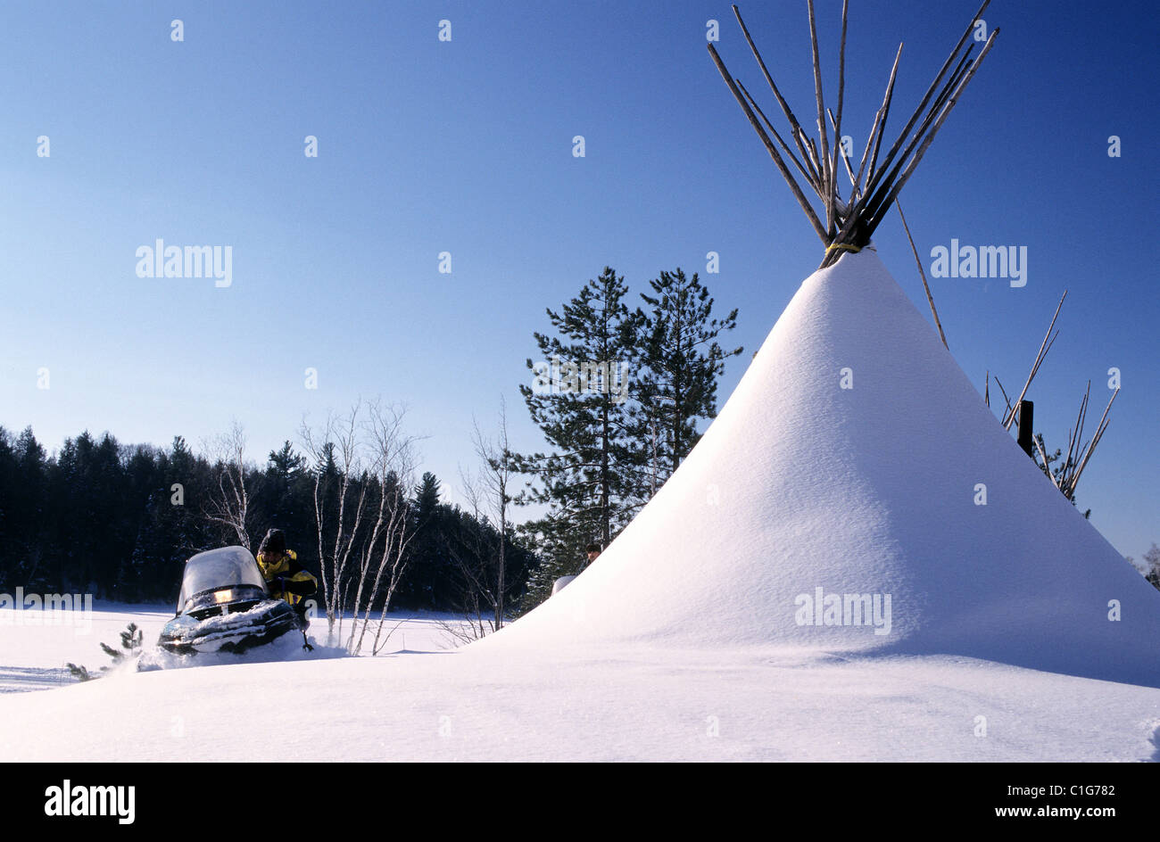 Canada, Quebec Province, man on snowmobile Stock Photo