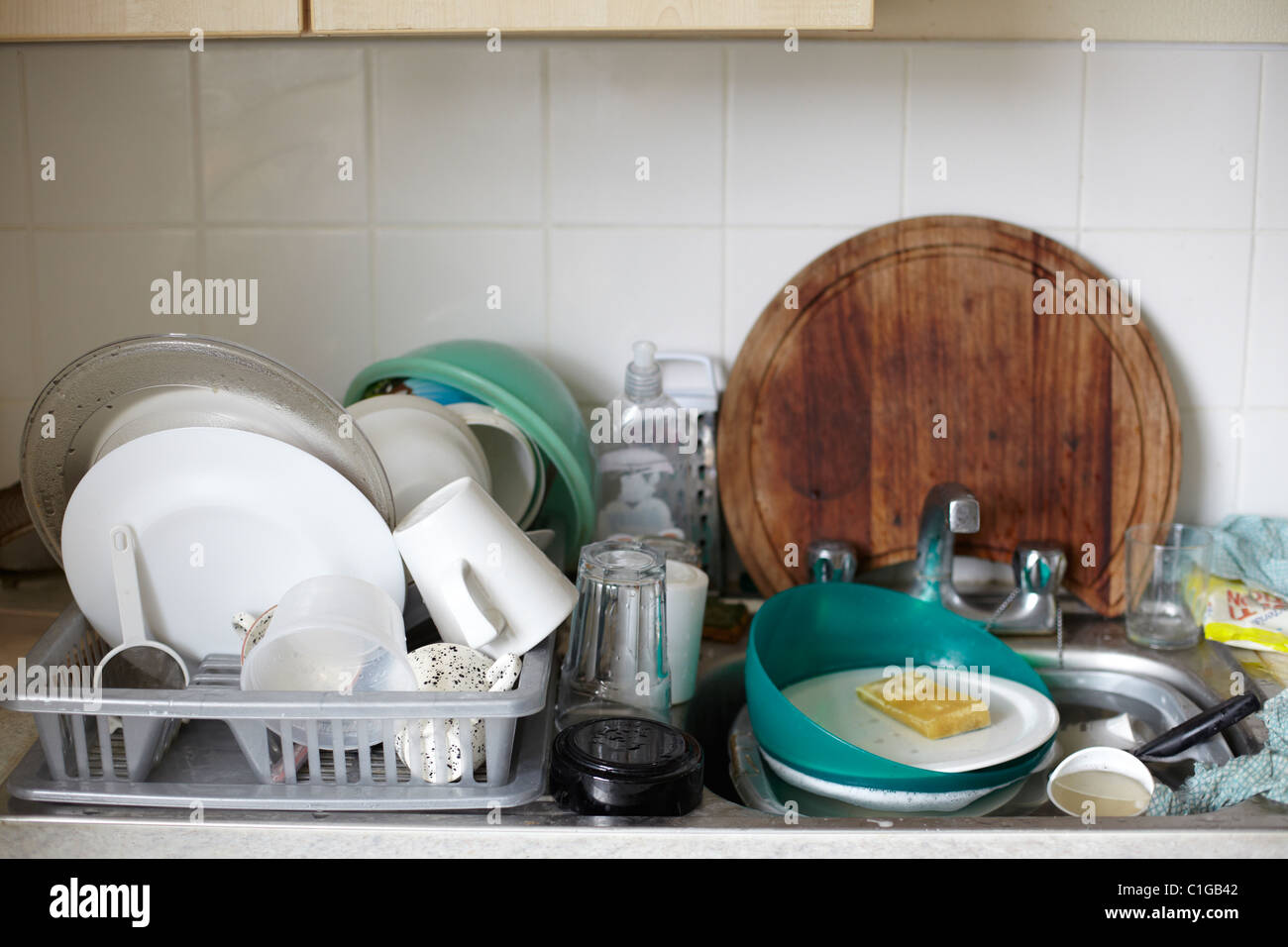 Messy sink with dirty sink Stock Photo - Alamy