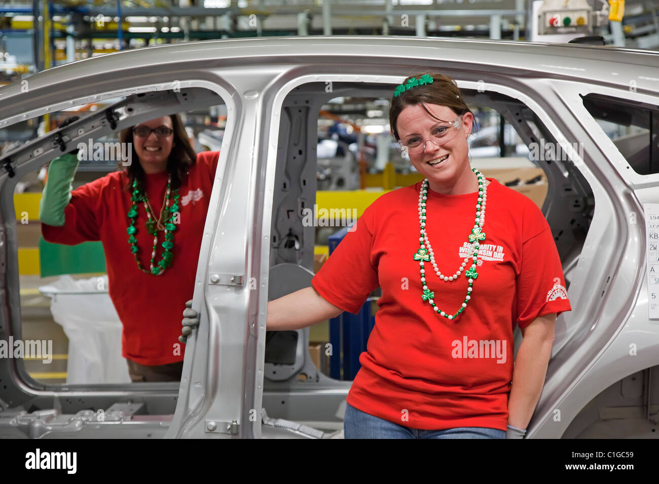 Workers assemble the 2012 Ford Focus at Ford Motor Co.'s Michigan