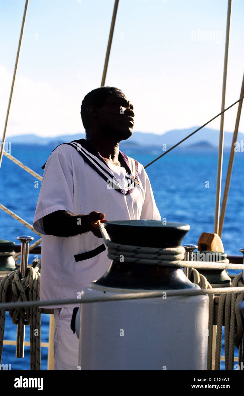 Caribbean sea, the five masted ship SPV Royal Clipper, sailor working on the deck Stock Photo