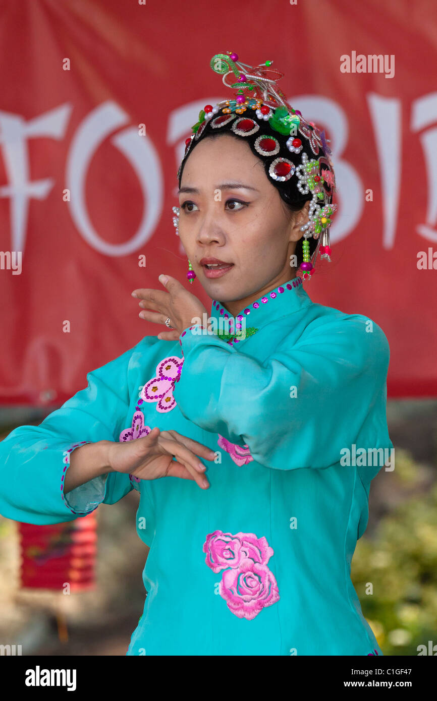 Ocean Rain Chinese female dance performer dancing in Dragon Boat
