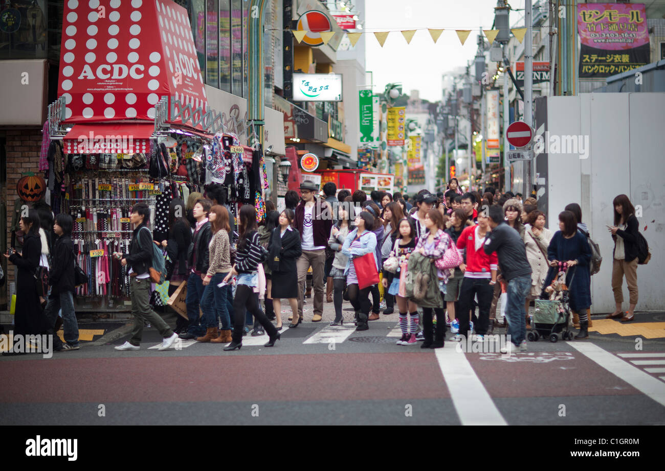 Pedestrians cross the busiest intersections Shibuya, Tokyo, Japan. Stock Photo