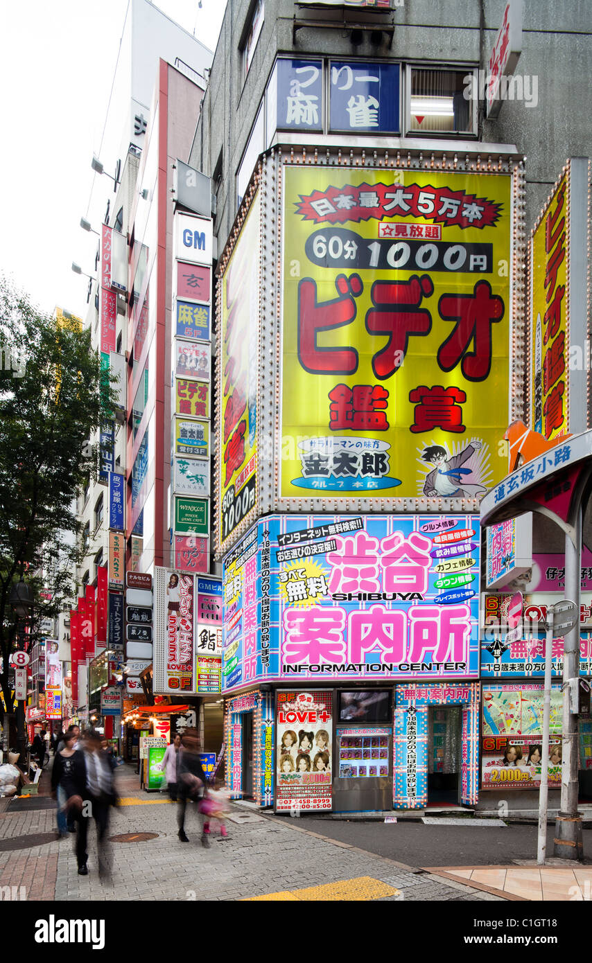 Pedestrians cross the busiest intersections in Shibuya, Tokyo, Japan. Stock Photo