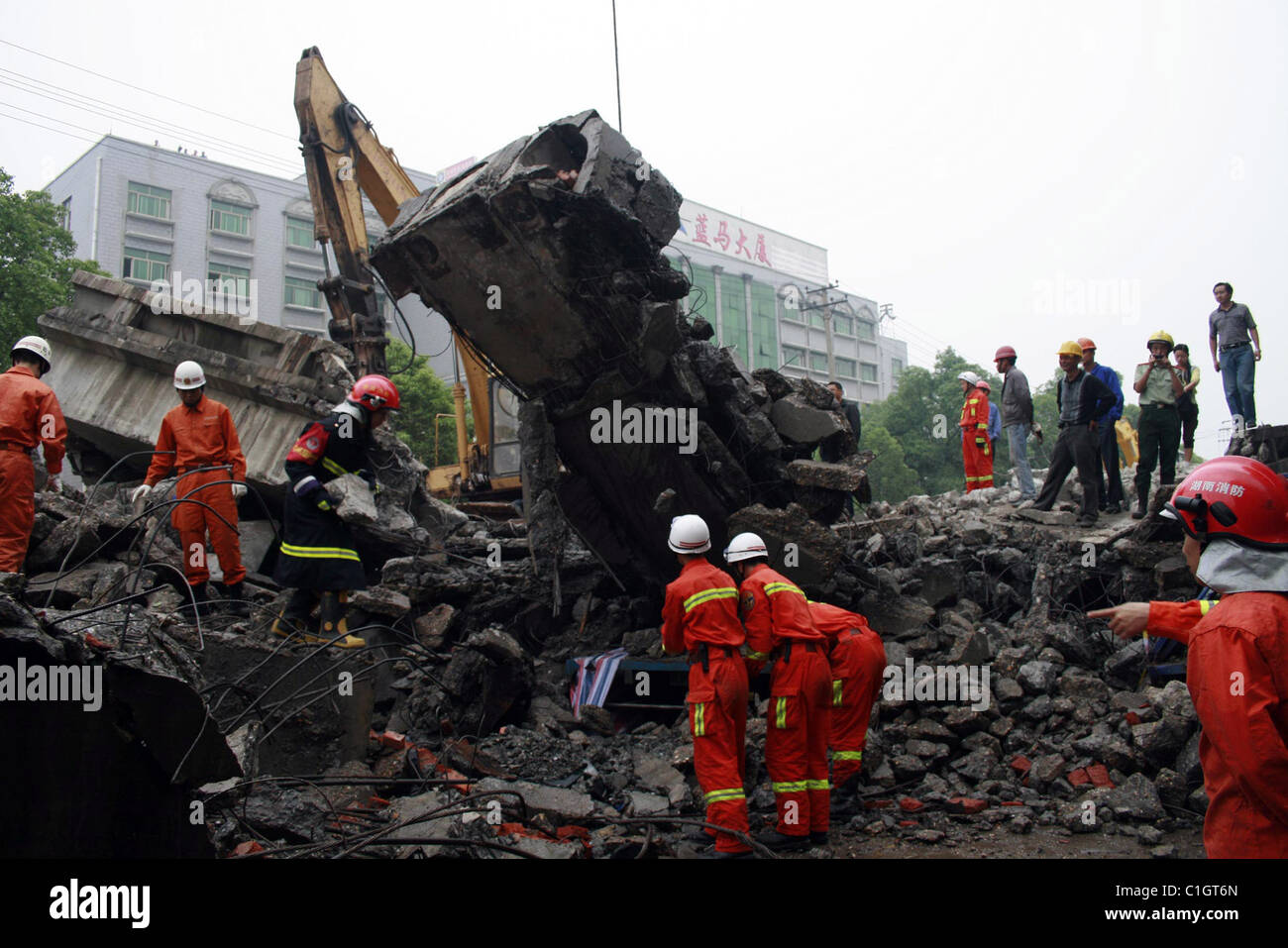 Viaduct collapse in China Rescuers investigate the rubble after a ...