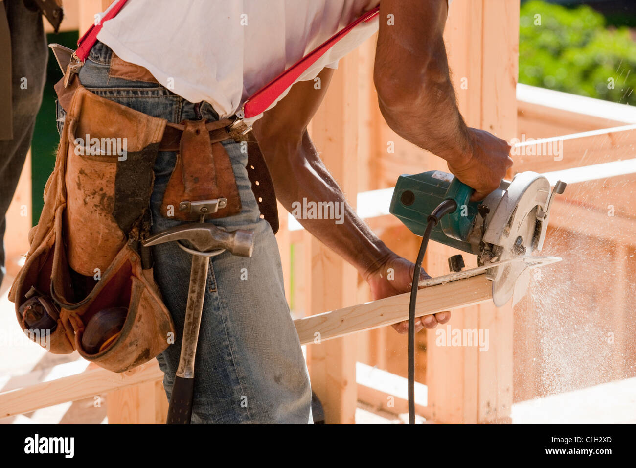 Carpenter cutting bevel with a circular saw Stock Photo Alamy