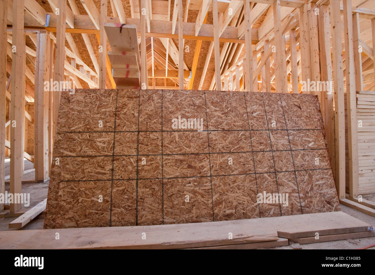 Roof sheathing in the upper floor of an under construction house Stock Photo