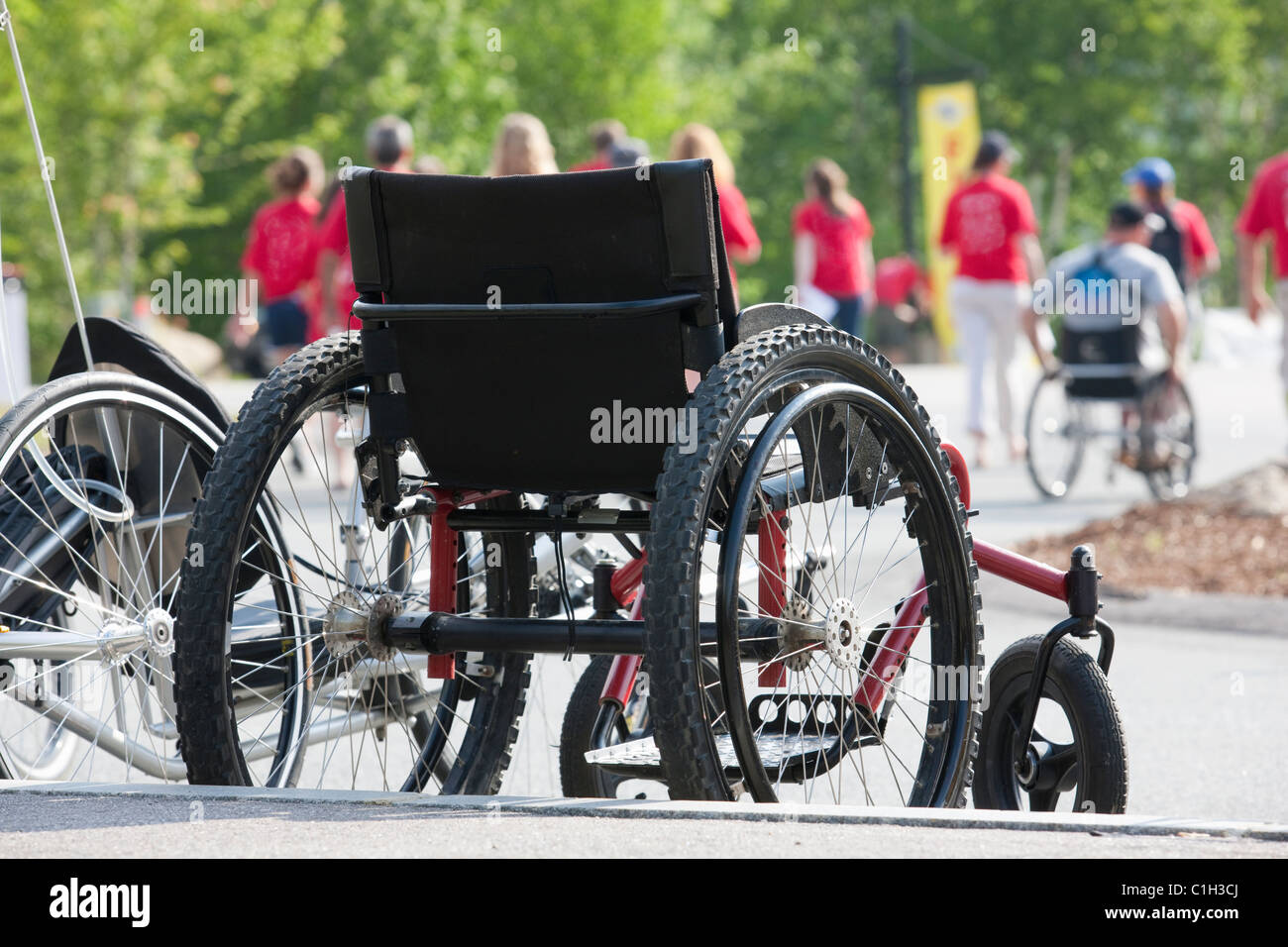 Wheelchair at the finish line of a bike race Stock Photo Alamy