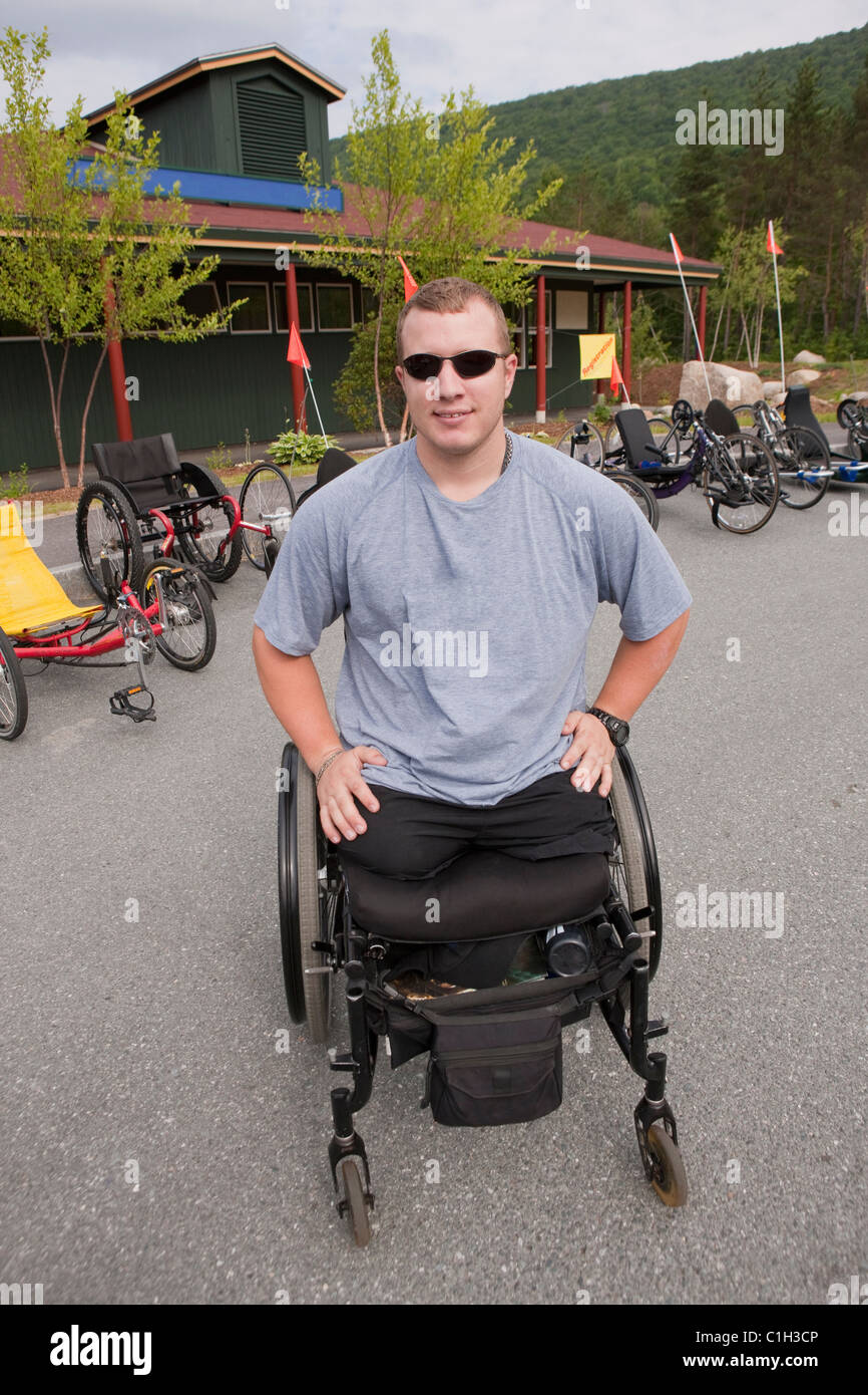 Man with leg amputee in a wheelchair preparing for a race Stock Photo