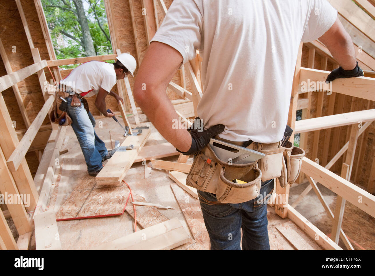 Carpenters working at a construction site.