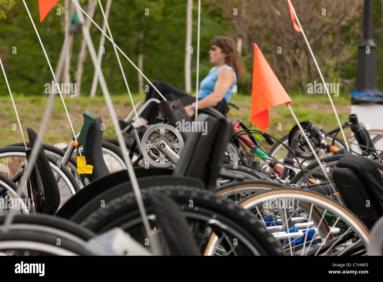Accessible racing bikes with a woman with spinal cord injury in a ...
