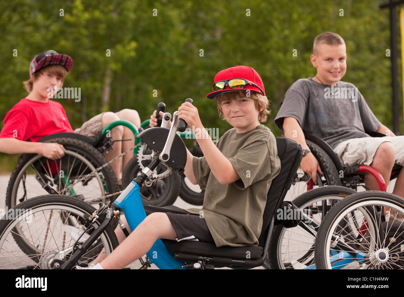 Able-bodied and disabled boys participating in a race Stock Photo