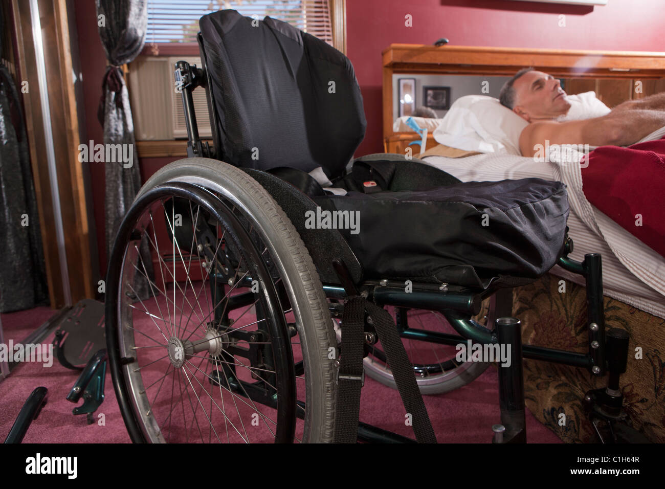 Man with spinal cord injury sleeping on the bed Stock Photo Alamy