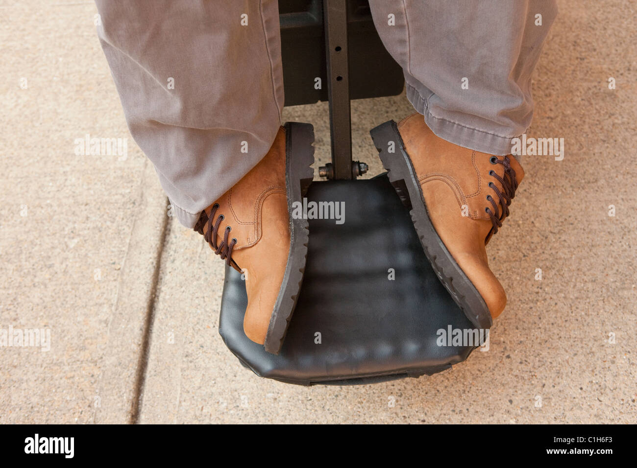 Degenerated feet of a man in a wheelchair with Duchenne muscular