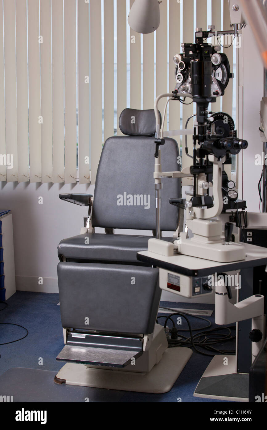 Examining chair and eye test equipment in a doctor's office Stock Photo