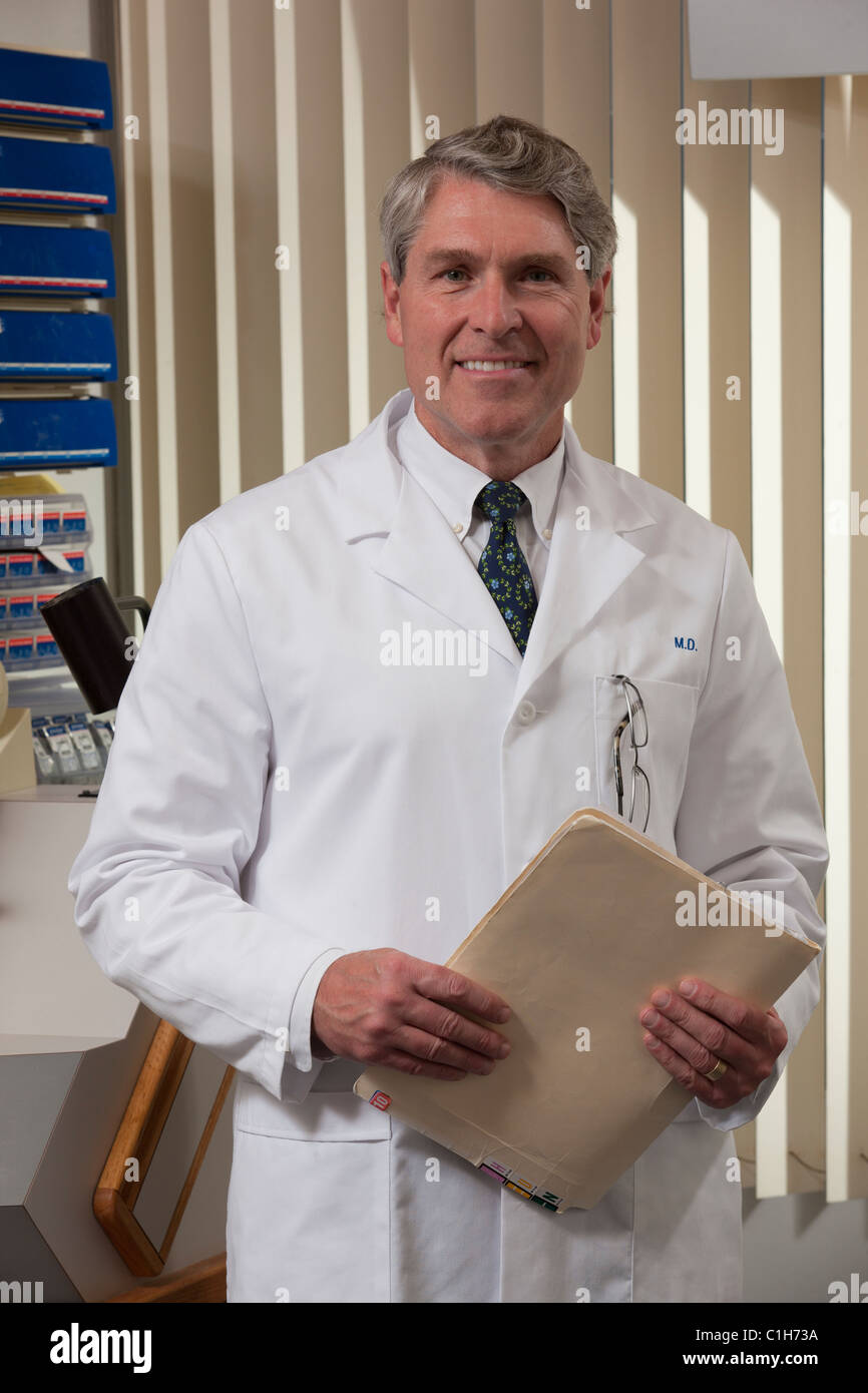 Ophthalmologist examining a medical report Stock Photo Alamy