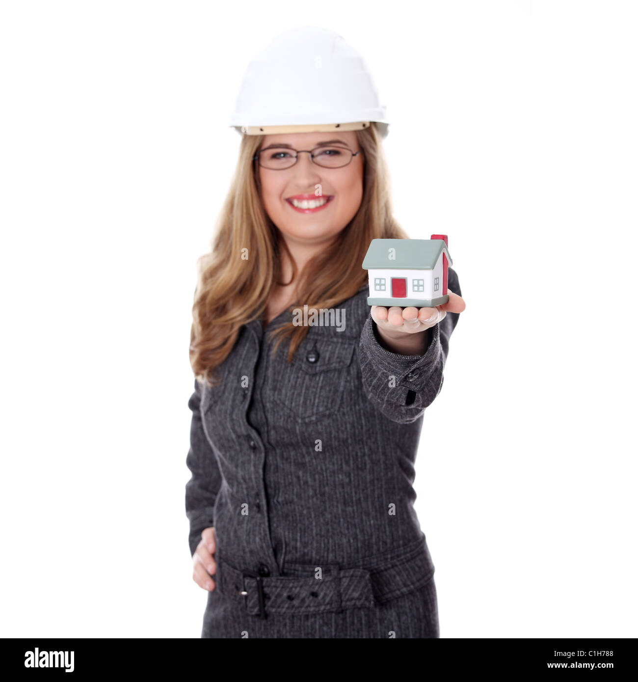 Young beautiful businesswoman with house model - real estate concept ...