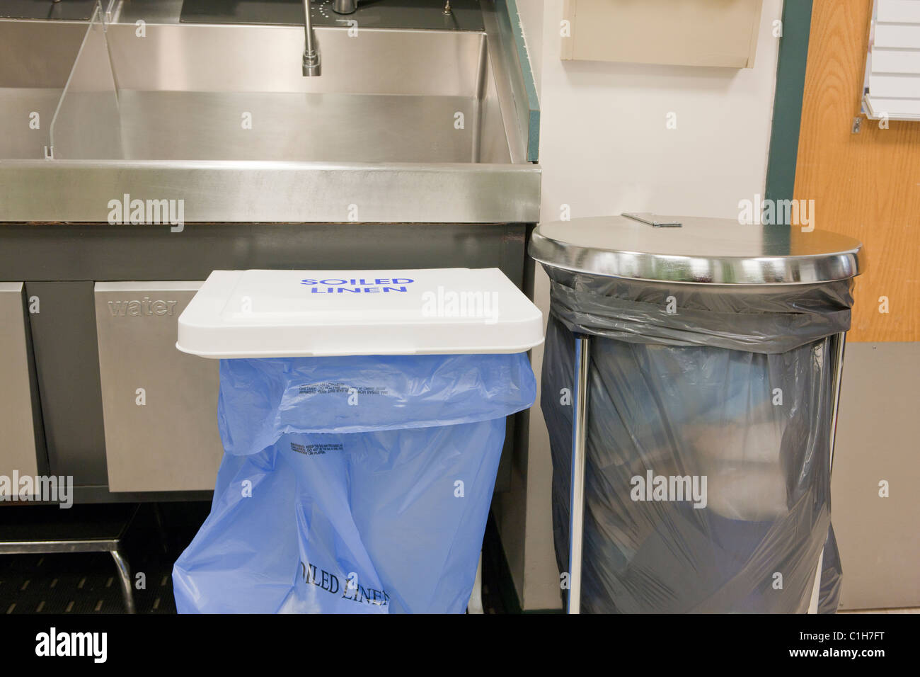 Hospital operating room sink and soiled linen bin Stock Photo Alamy