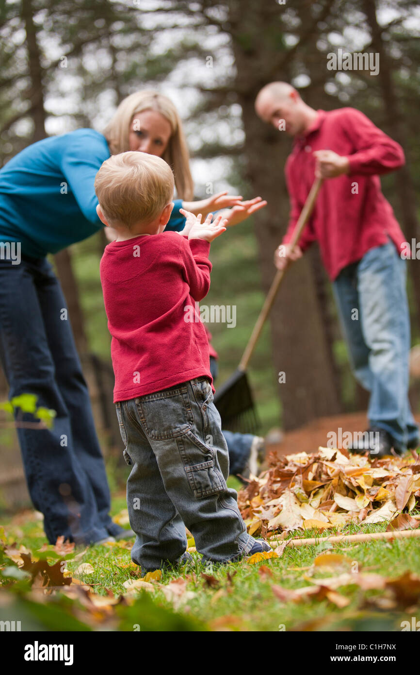 Woman signing the word 'Rake' in American Sign Language while communicating with her son in a