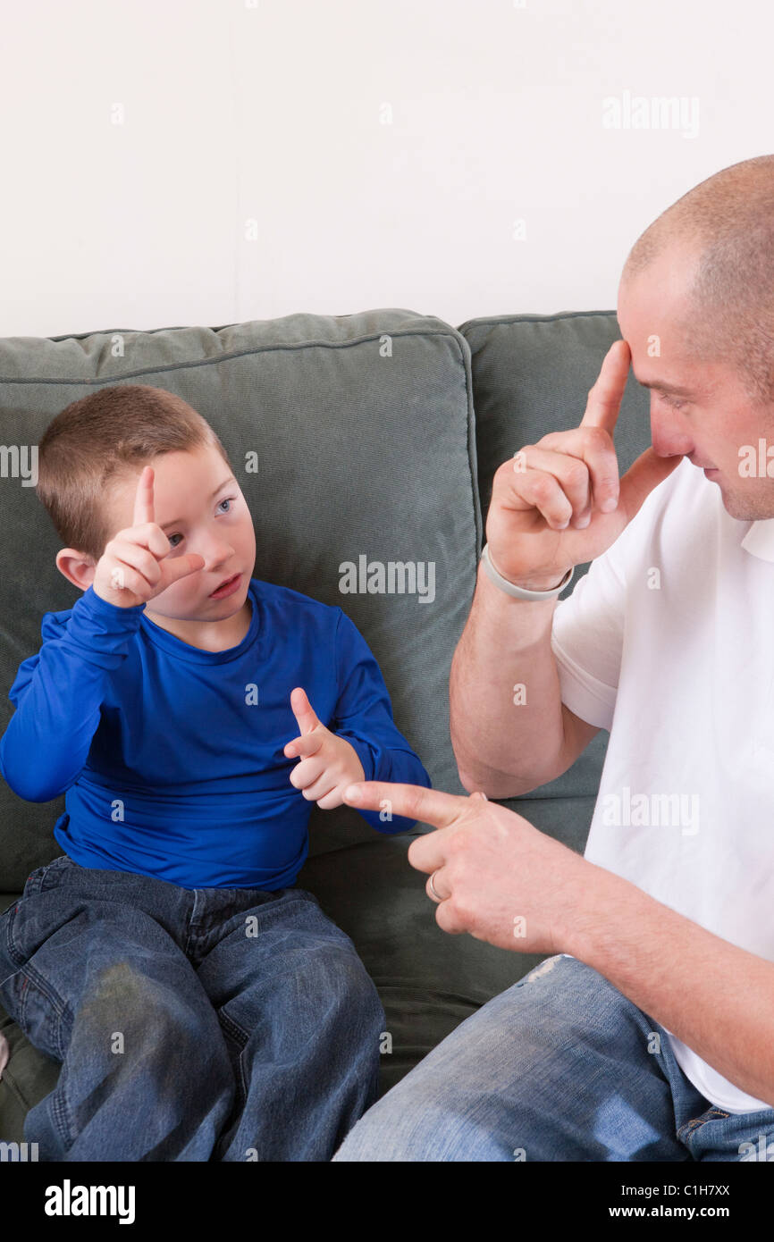 man-signing-the-word-brother-in-american-sign-language-while