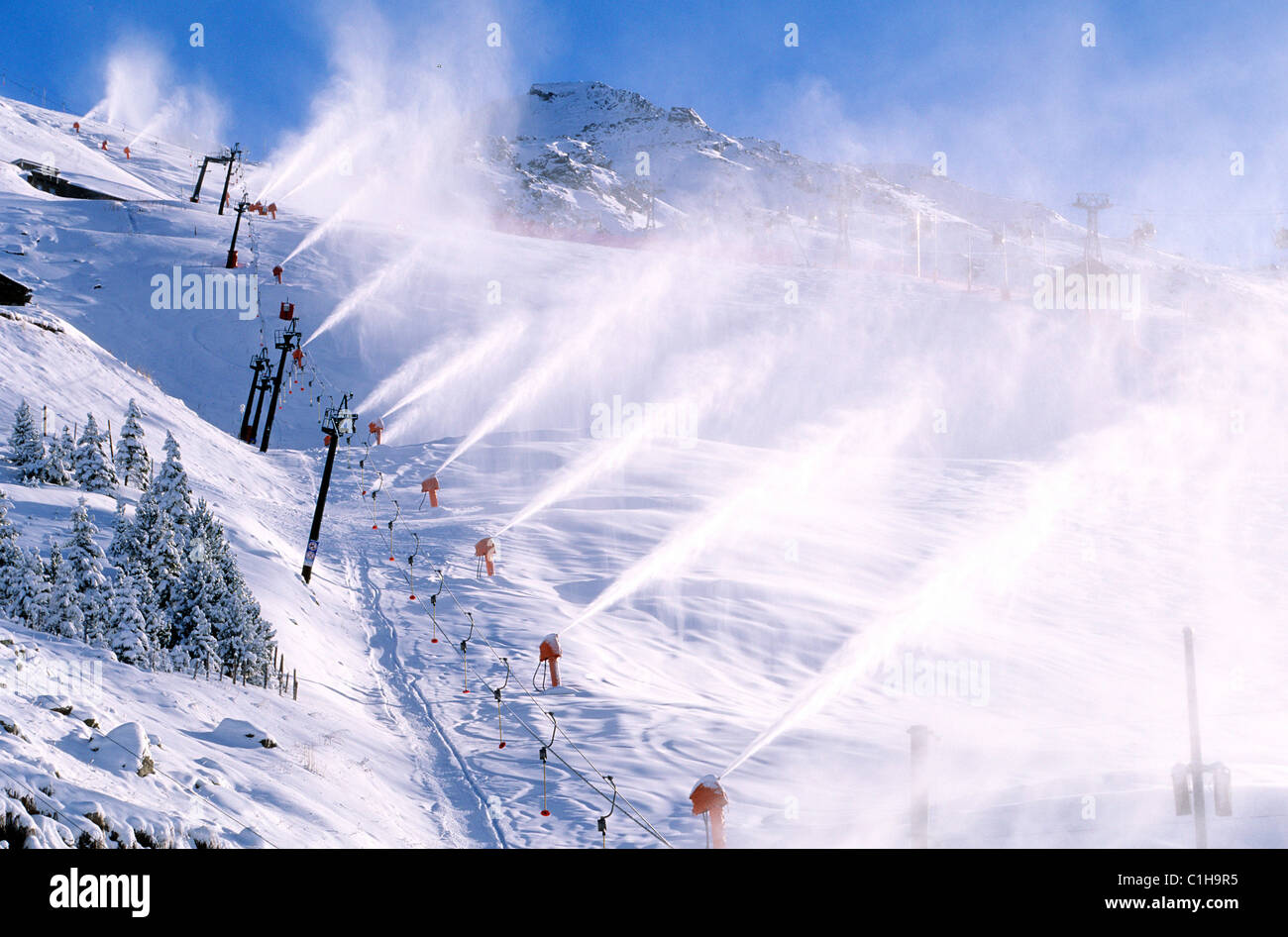 France, Savoie, Les Menuires, snow cannons, artificial snow Stock Photo
