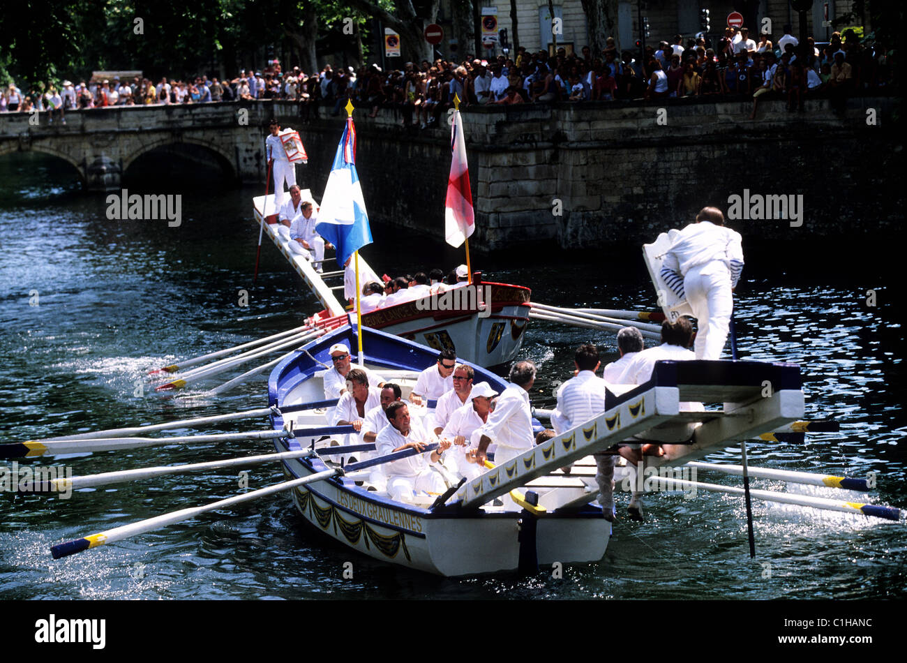 France, Gard, Nimes, water joust on canal de la fontaine during the feria (annual festival of Nimes) Stock Photo