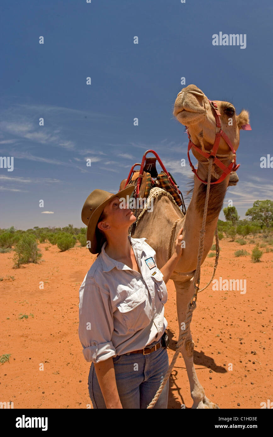 Australia, Northern Territory, Kings Creek, Camel riding with the guide ...