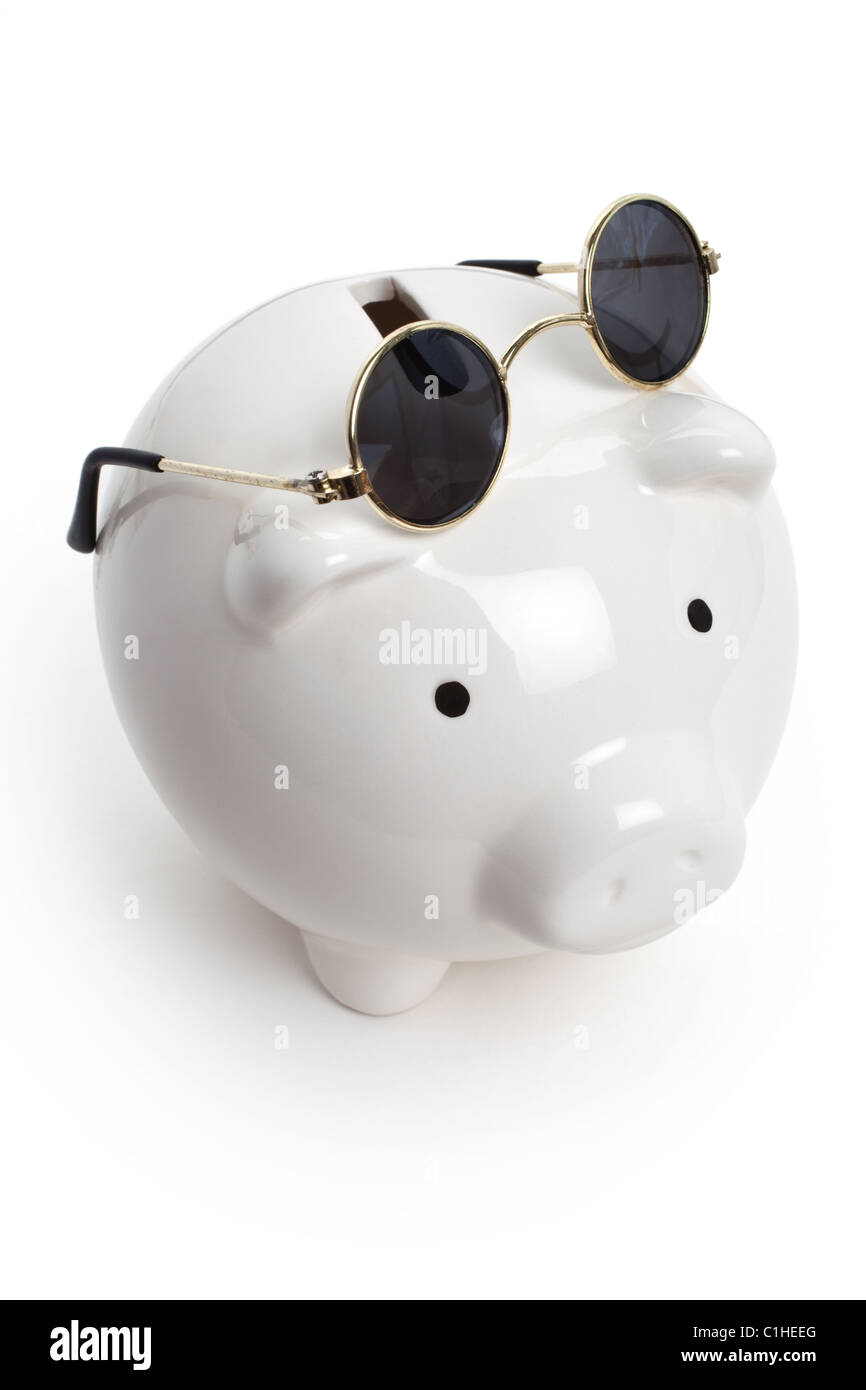 Piggy Bank and Sunglasses, concept of savings Stock Photo
