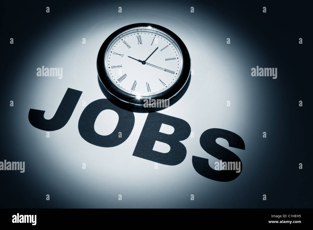 Clock and word of Jobs for background Stock Photo Alamy