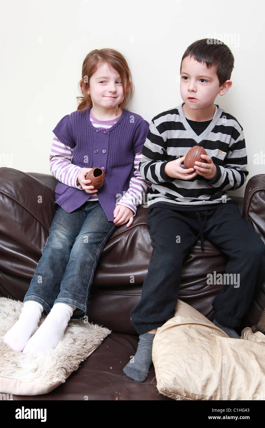 Children eating chocolate Easter Eggs, UK Stock Photo Alamy