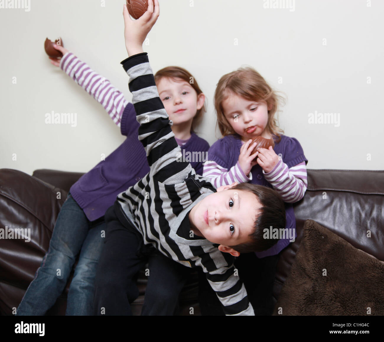 Children eating chocolate Easter Eggs, UK Stock Photo - Alamy