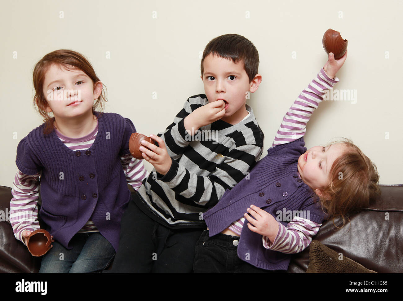 Children eating chocolate Easter Eggs, UK Stock Photo Alamy