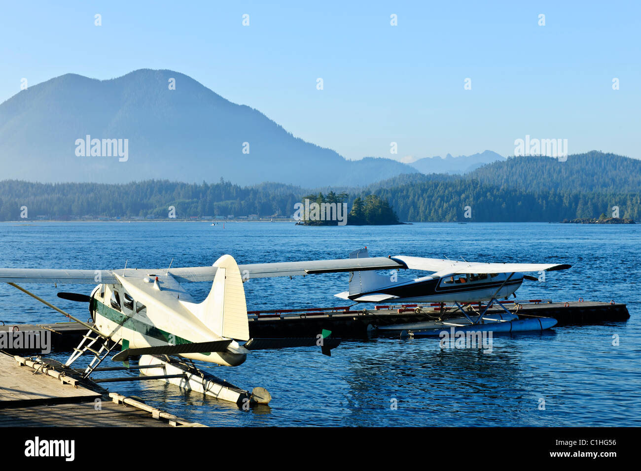 Seaplanes at dock in Tofino on Pacific coast of British Columbia, Canada Stock Photo