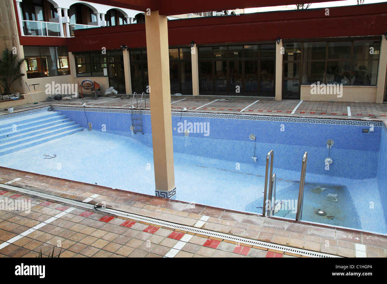 Empty hotel swimming pool out of season. Stock Photo