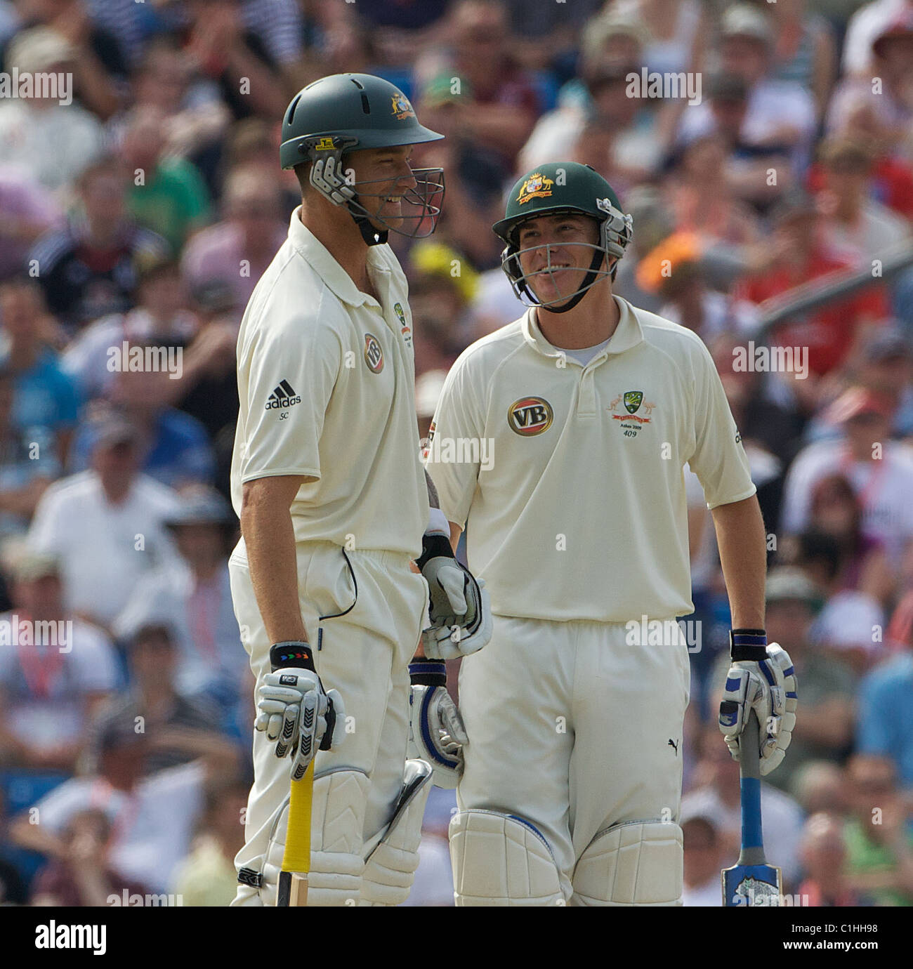 Stuart Clark And Marcus North Discuss One Of Clark's Sixes During The 