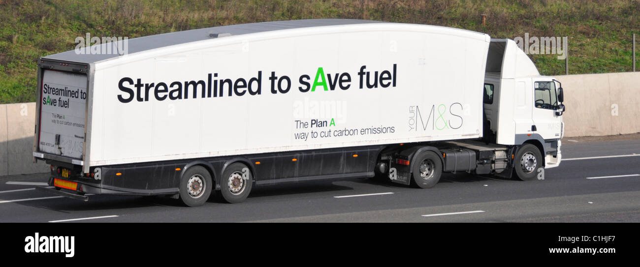 Daf Marks and Spencer supply chain store delivery lorry truck with streamlined aerodynamic M&S trailer shape to save fuel driving along UK motorway Stock Photo