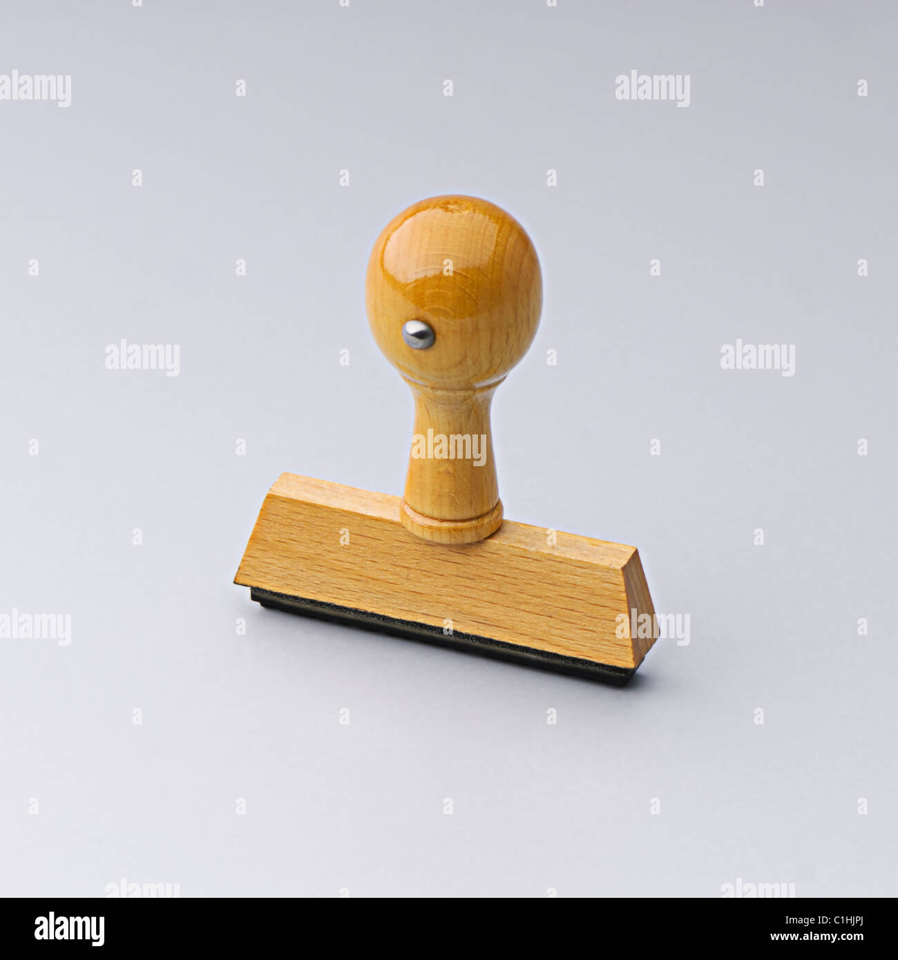 Old rubber stamp, isolated on light grey background with shadow Stock Photo Alamy