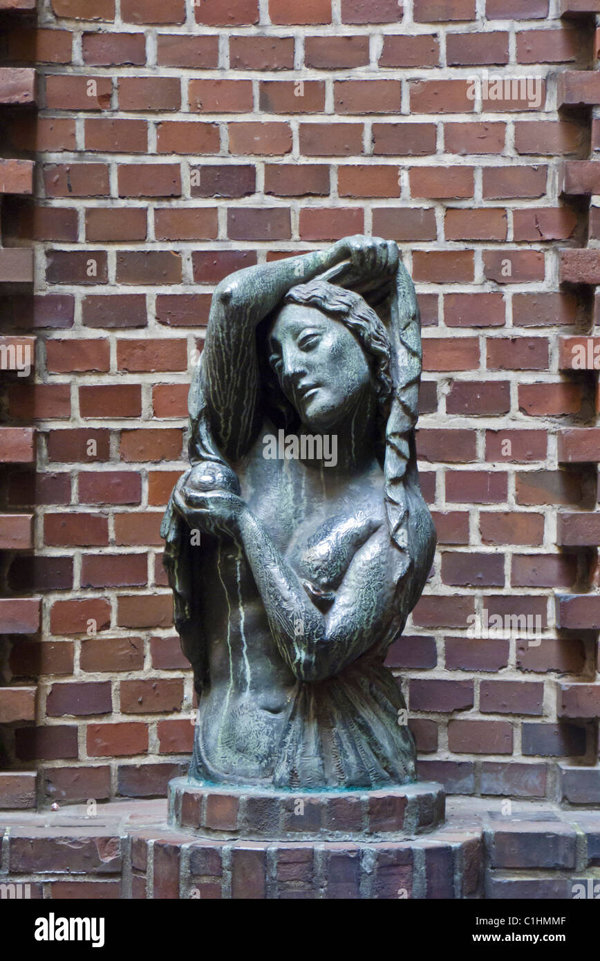 Statue of a woman in the Böttcherstraße (Böttcher Street) - Bremen, Germany Stock Photo