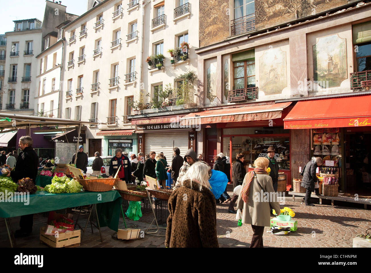 Paris, France - Rue Mouffetard, a street in the 5th arrondissement, one of the oldest and liveliest neighbourhoods Stock Photo