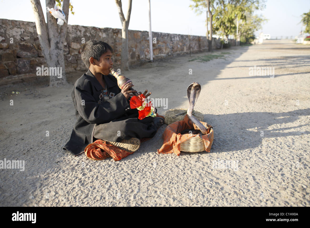 IND, Indien,20110310, Kleiner Junge als Schlangenbeschwoerer © Gerhard Leber Stock Photo