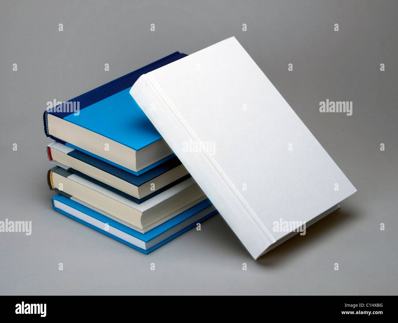 Plain white book and four colour books, for design layout Stock Photo