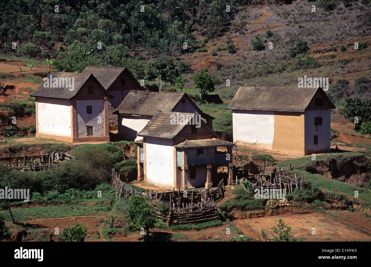 Traditional Betsileo Village of Earth or Adobe Houses with Thatched Roofs, north of Fianarantsoa, Central Highlands, Madagascar Stock Photo