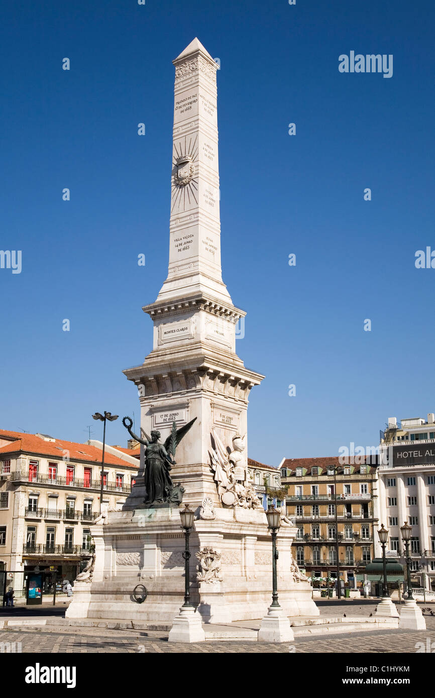 The Obelisk of Praca dos Restauradores in central Lisbon Stock Photo ...