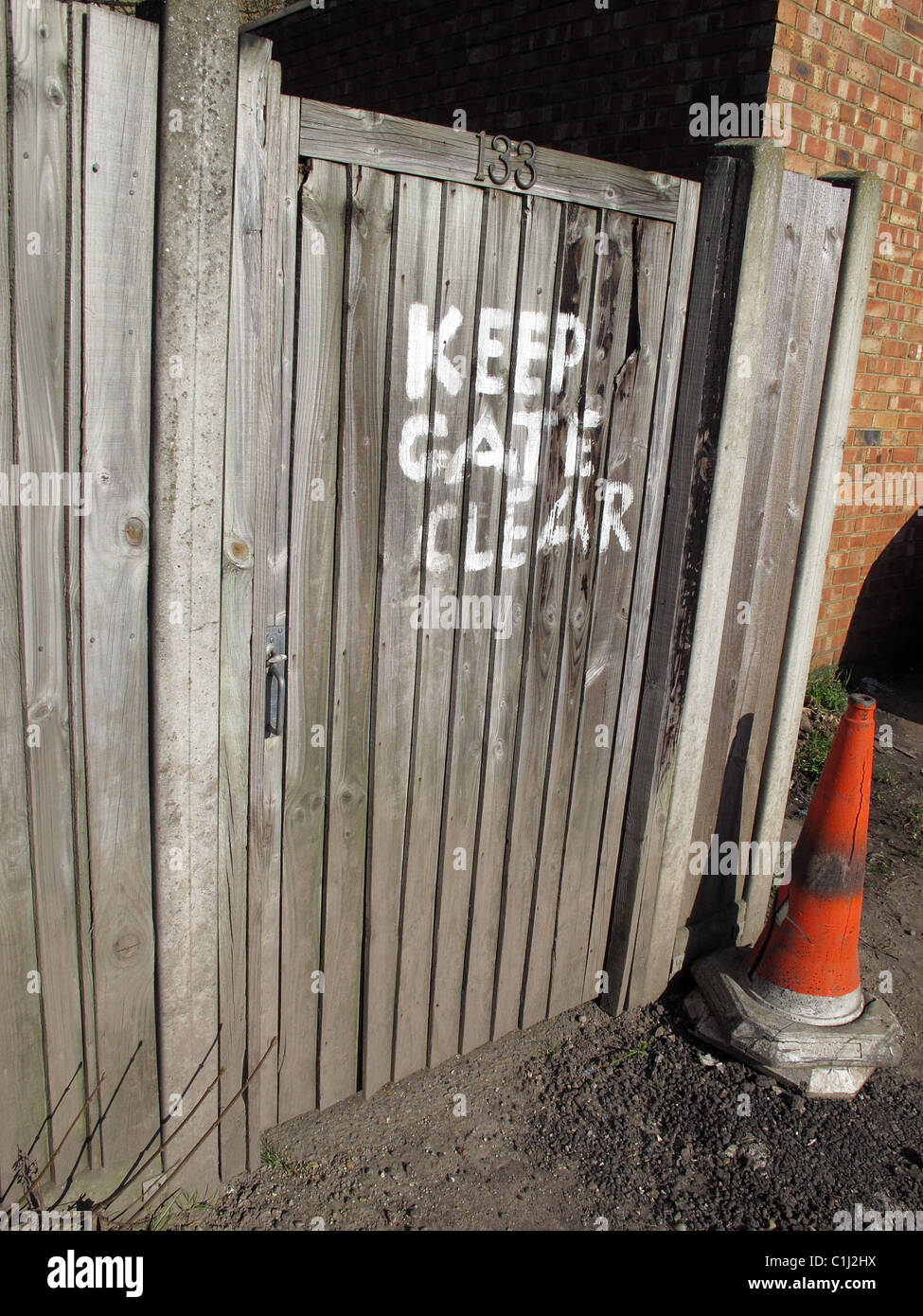 Keep gate clear notice. Stock Photo