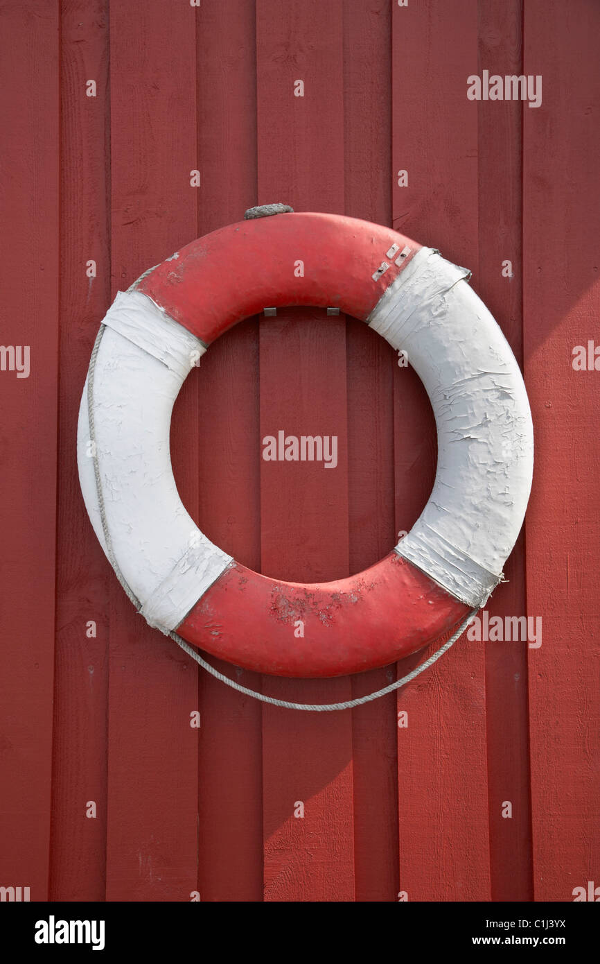 Life Ring Hanging on Wall, Vest-Agder, Southern Norway, Norway Stock Photo