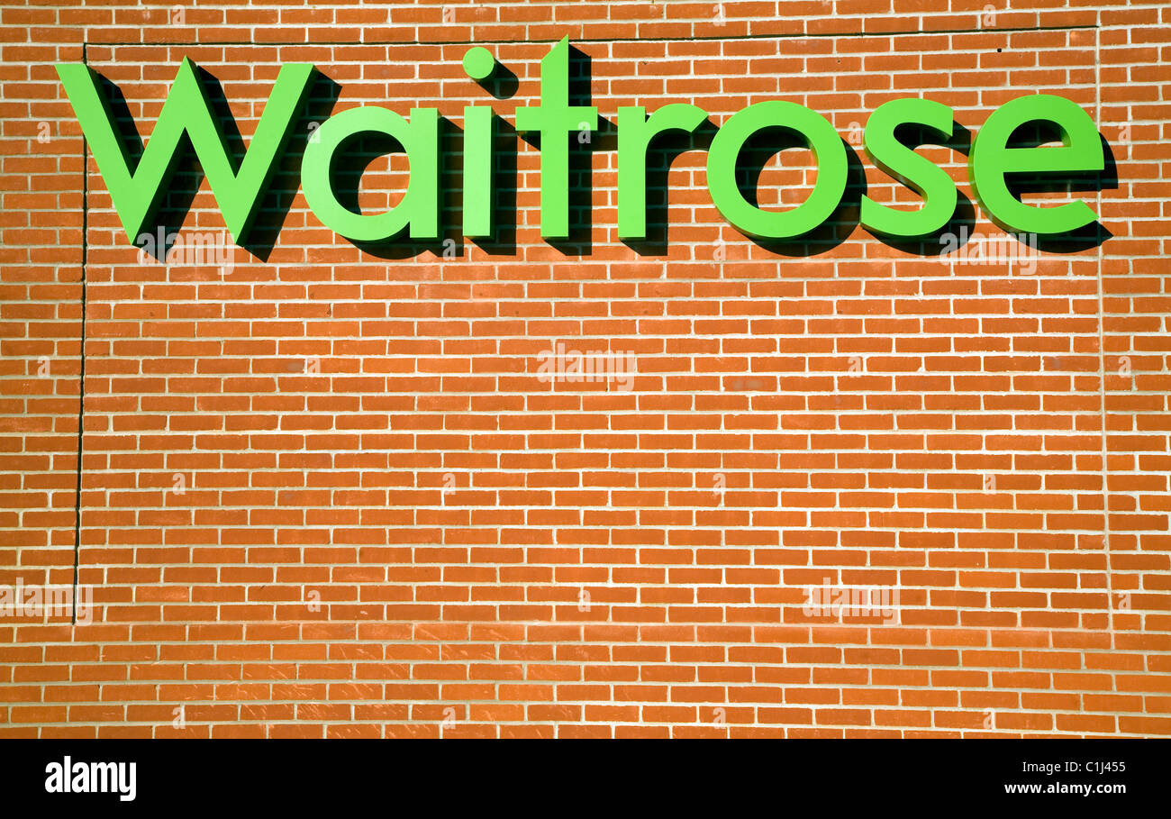 Waitrose shop sign brick wall Stock Photo