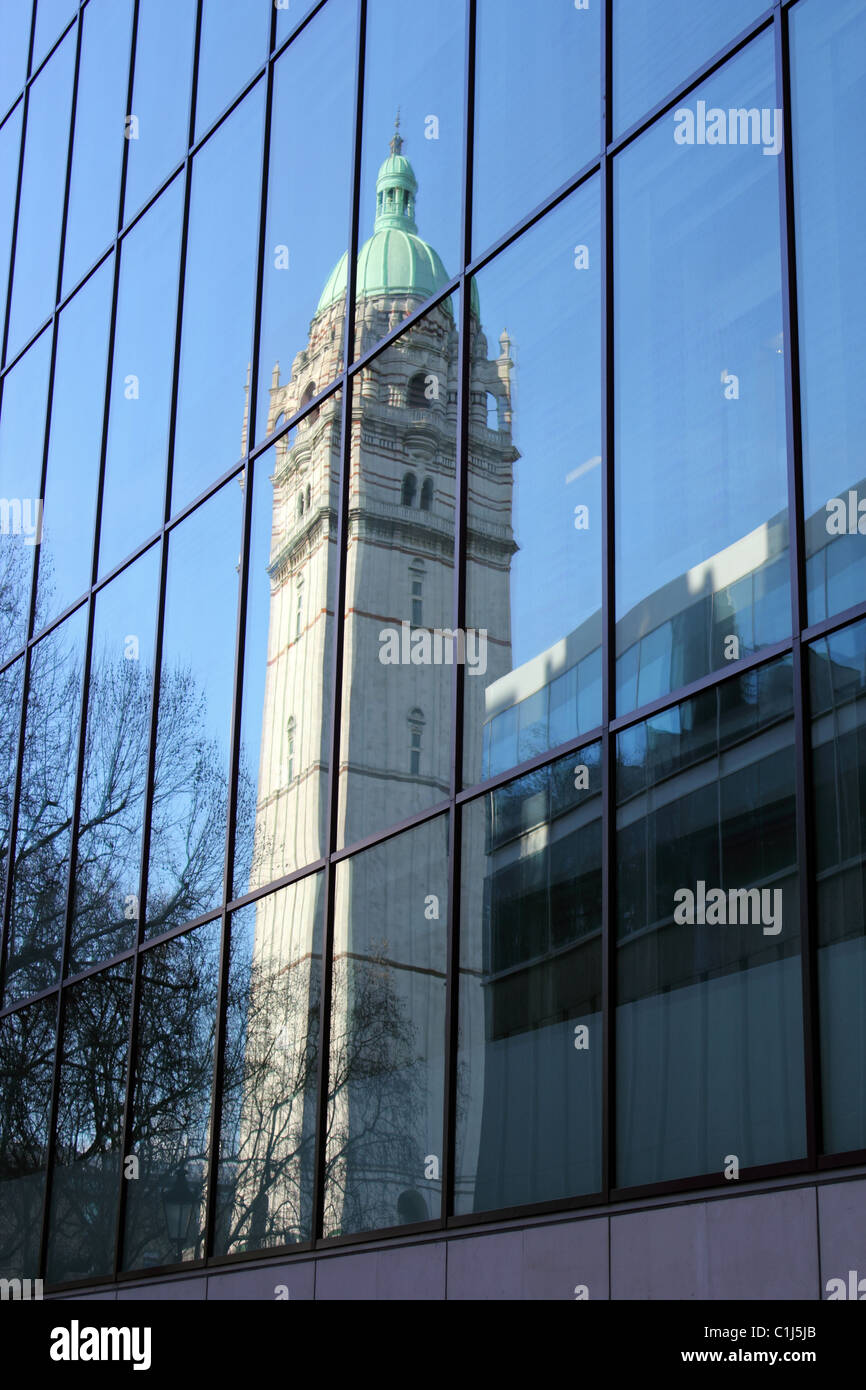 The Queen's Tower reflected in modern buildings at Imperial College London, South Kensington, London, England, UK Stock Photo