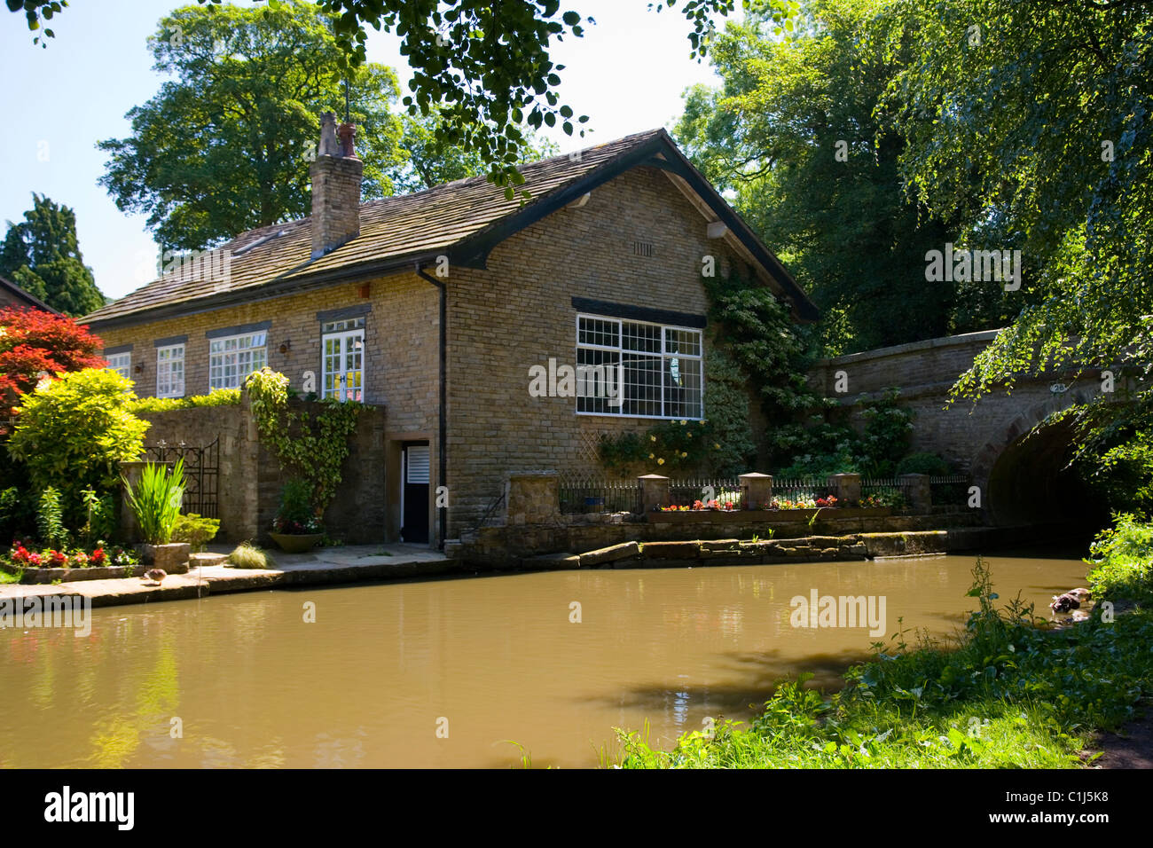 Canalside Cottage on the  Macclesfield Canal at Bollington in Cheshire;England; Stock Photo